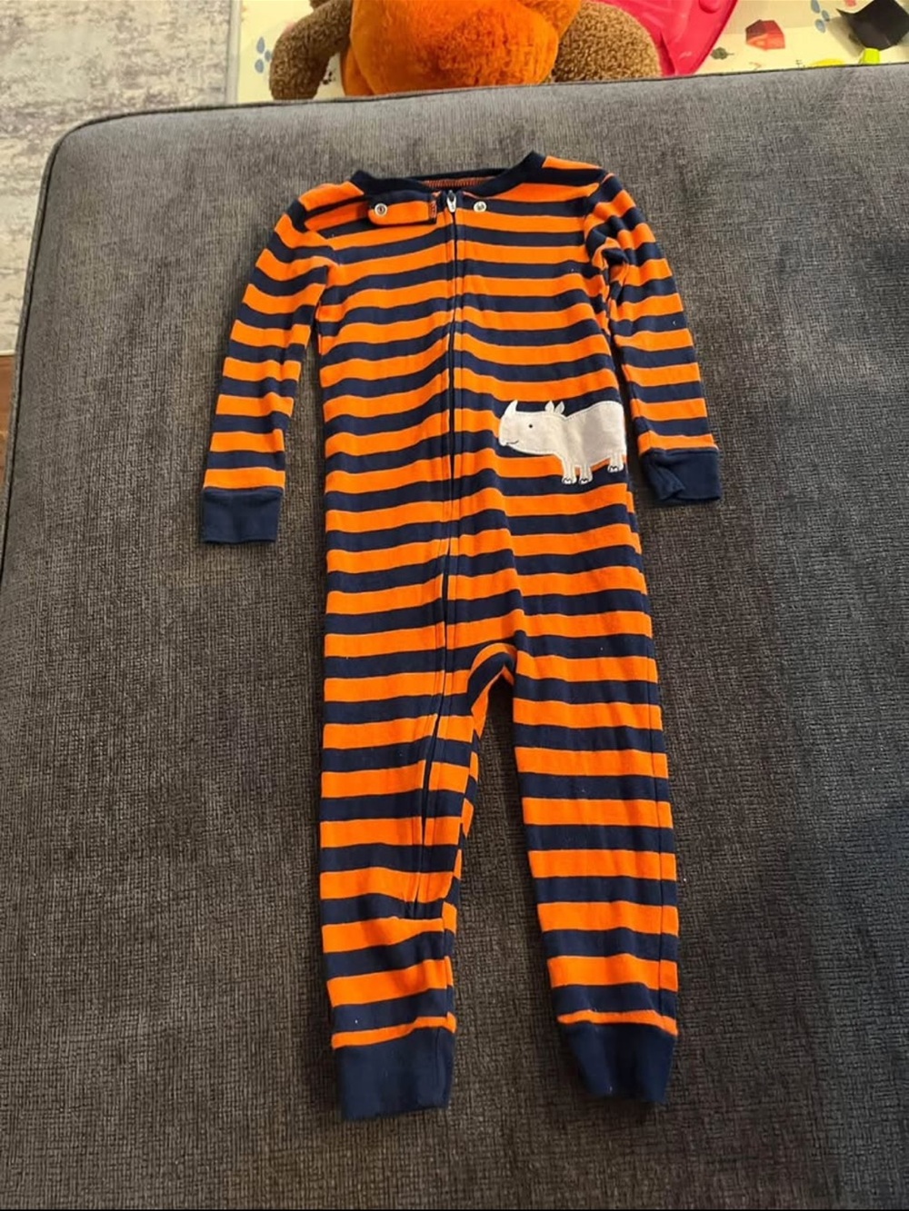 Kids Striped One-Piece Pajamas in Orange and Navy with Rhino Patch